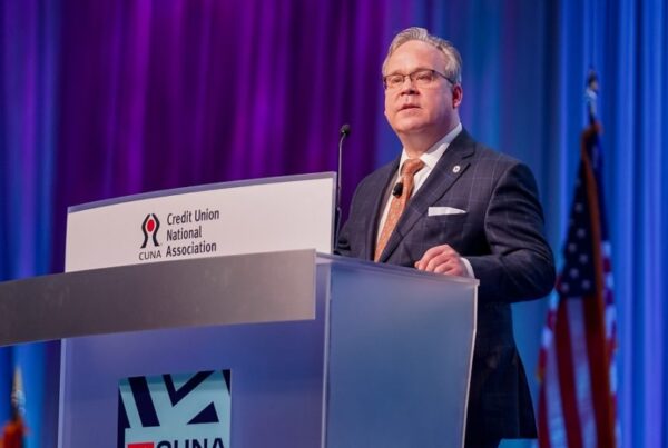 Photo of NCUA Chairman, Todd Harper on stage speaking at an event.